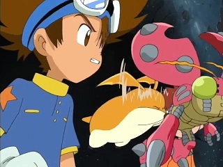 Taichi prepares for battle. Behind him, the beetle-like Tentomon is flying into action entirely too slowly, so Patamon is pushing him forward.