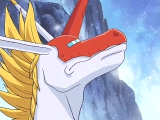 A white unicorn with long ears, a yellow mohawk-mane, and a red mask with a rectangular visor in in the front (not reaching out to where horses' eyes are), and a mouth that extends out to the bases of his ears - far larger than a horse's mouth.