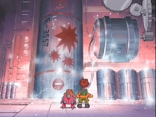 Koushirou, a boy with short, red hair wearing an orange shirt, brown shorts, yellow gloves, and a green laptop case, stands with Tentomon before what looks like gigantic AA battery. The battery is labeled "1.5 lowercase 'm' uppercase 'V')